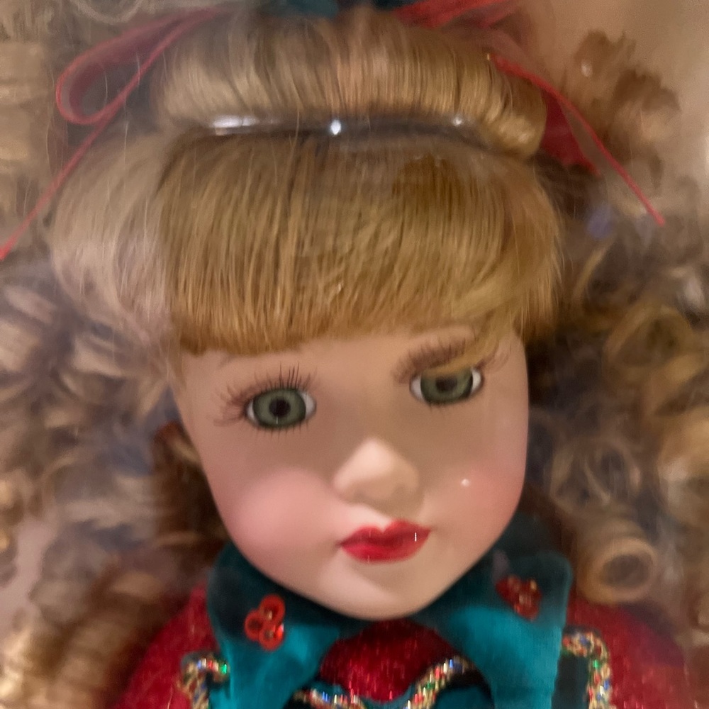 Genuine Porcelain doll by Melissa Jane